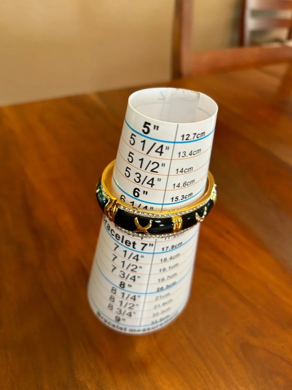 Gold-Tone Black Enamel X Accent Bangle Bracelet